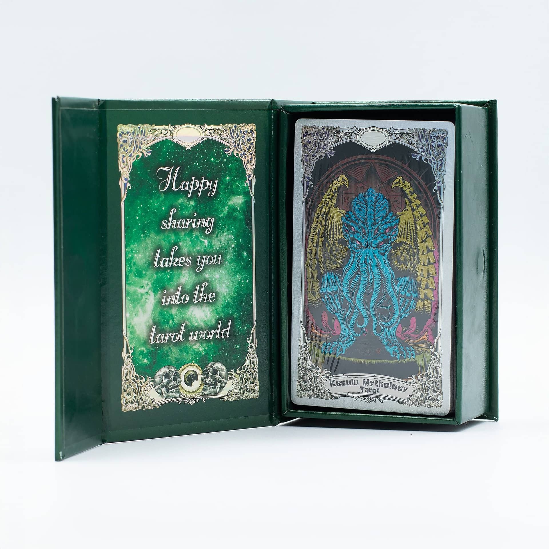 Mythology tarot cards laid out beside the illustrated guidebook