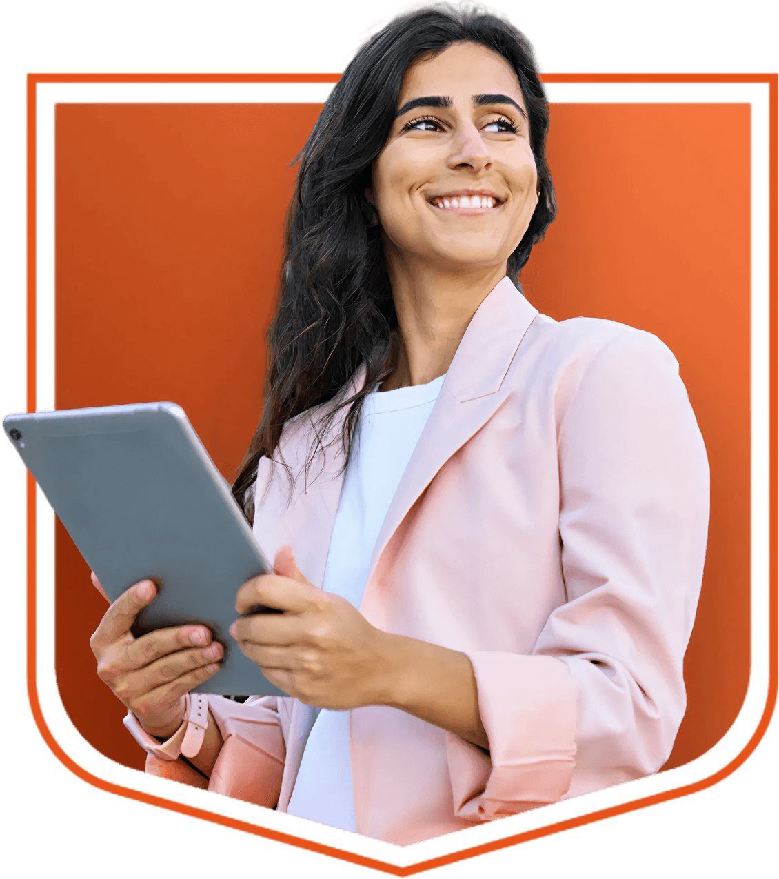 
  A smiling woman with long dark hair holds a tablet in both hands.
  She is wearing a light pink blazer and a white top, standing against an orange shield-shaped background.
