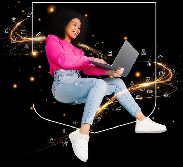 Woman smiling while learning on a laptop