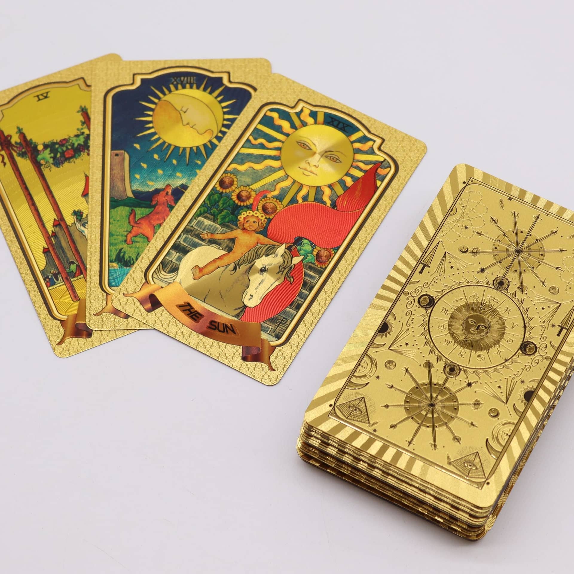 Close-up of gold foil detail on a tarot card