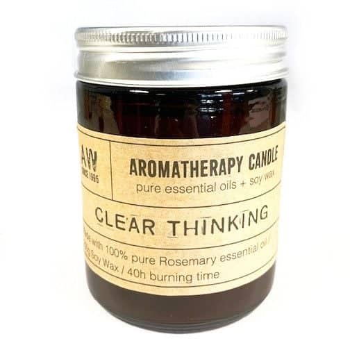 Soy wax candle beside its kraft gift box