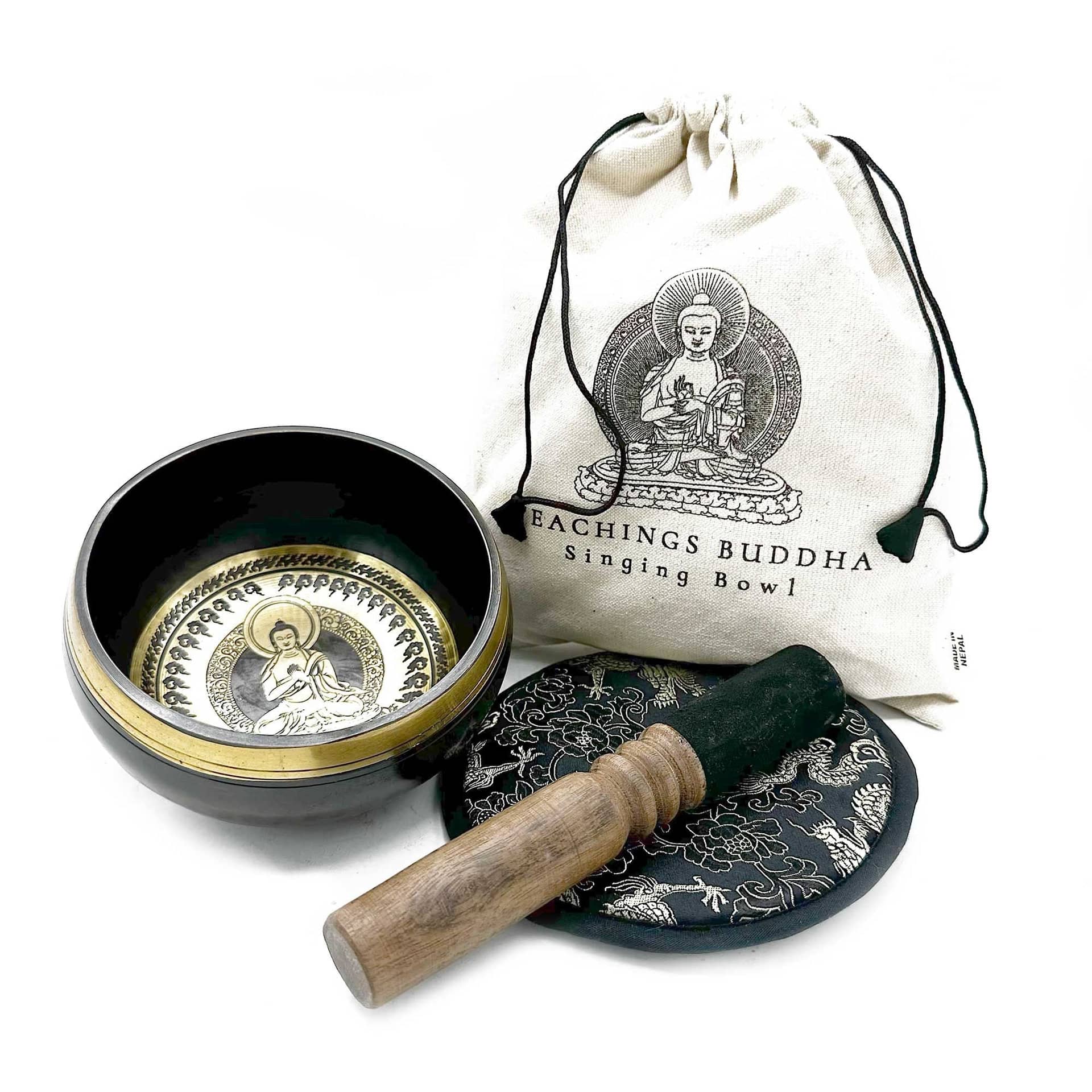 Buddha singing bowl gift set engraved with Buddhist symbols, with mallet, cushion and pouch