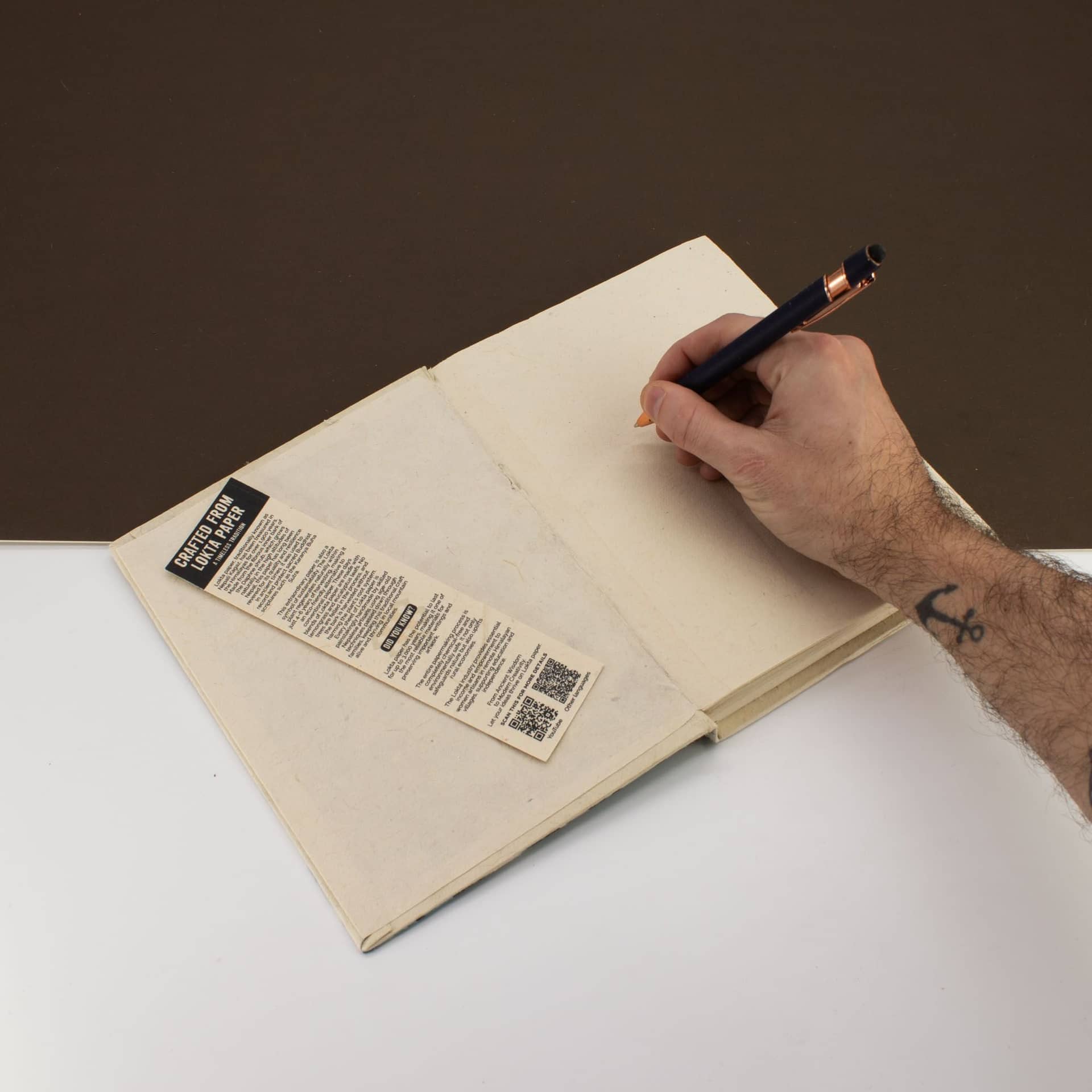 Lokta notebook open with bookmark