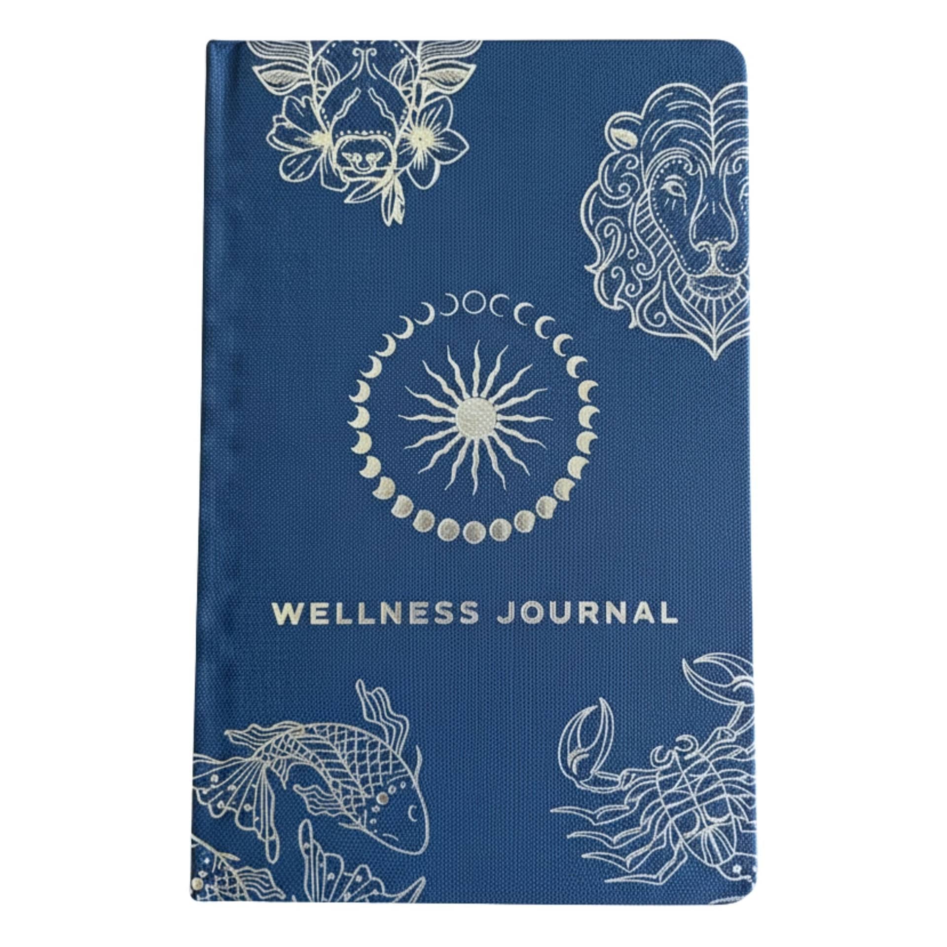 Midnight blue wellness journal with silver zodiac cover
