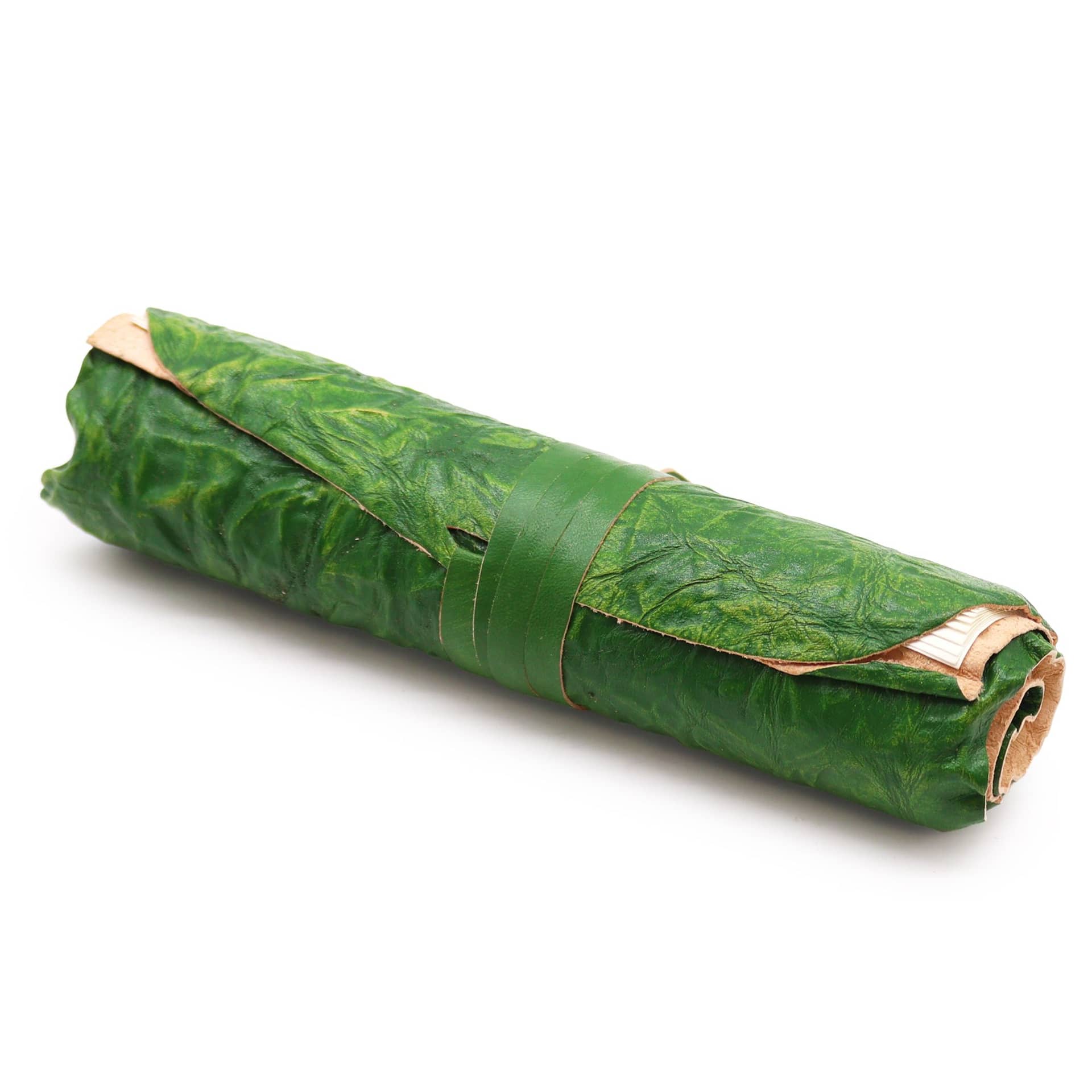 Green rolled leather travel notebook with strap closure
