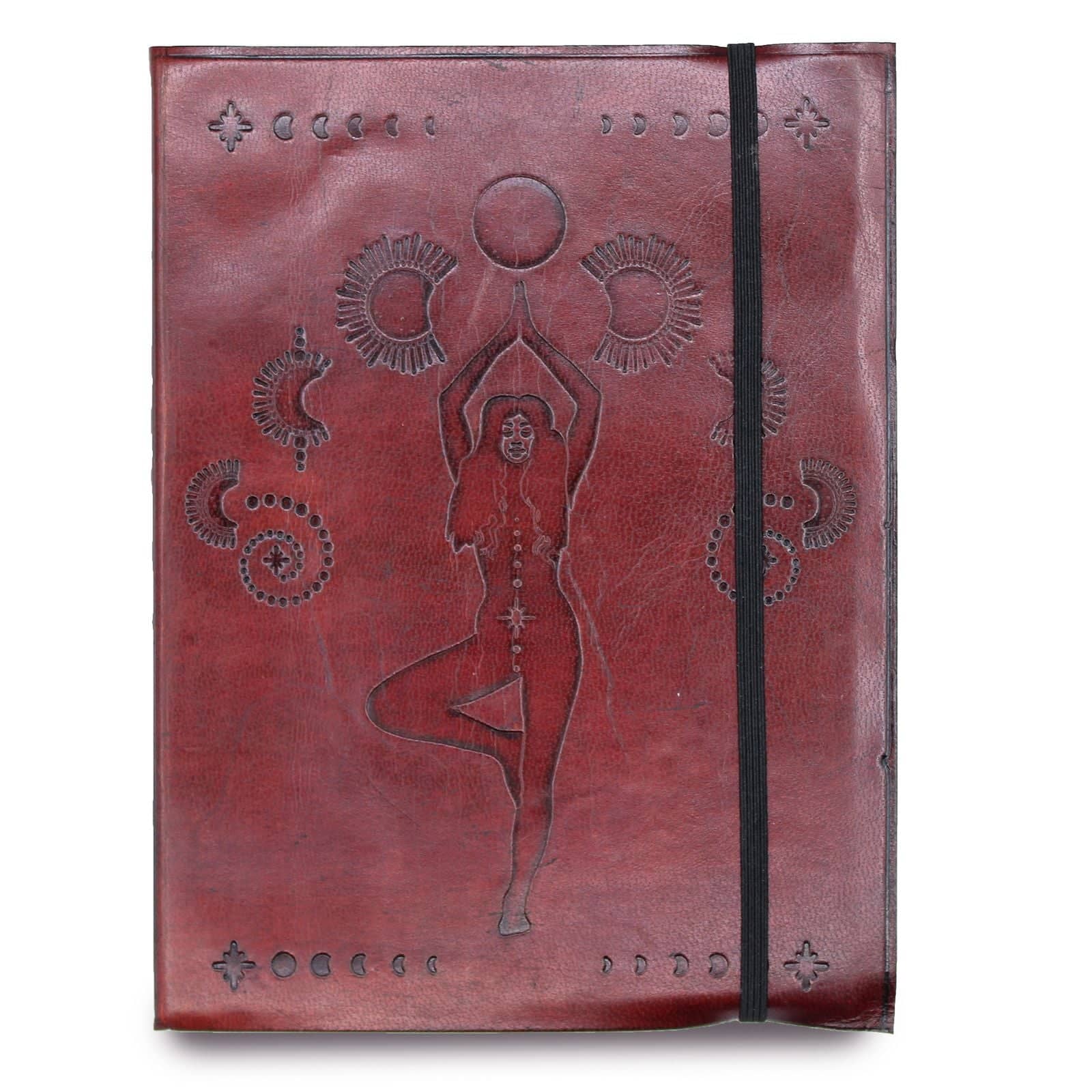Close-up of the cosmic goddess design on the leather cover