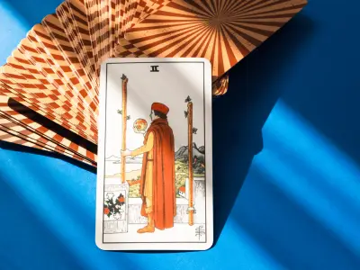Two of Wands Tarot Card Meaning: Love, Health & Spiritual Insights