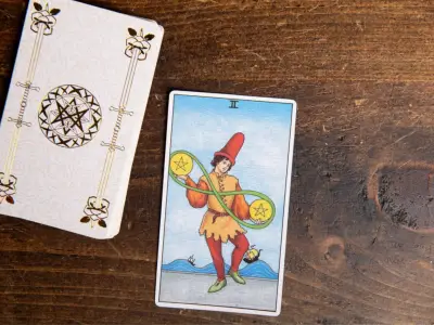 Two of Pentacles Tarot Card Meaning: Love, Health & Spiritual Insights