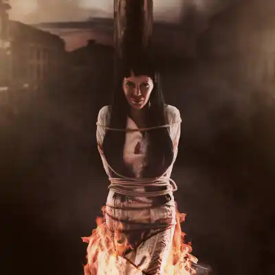 Witch tied to a stake.