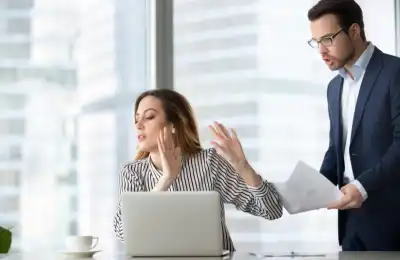 woman dismissing man at work