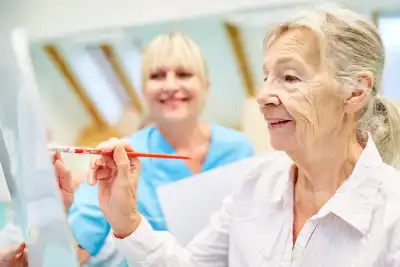A woman engaging in art therapy