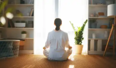 person meditating at home