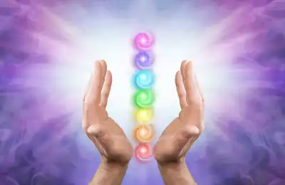 Image of the chakras and healing hands.