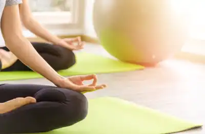 People about to start a yin yoga class from a qualified teacher.