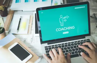 Image of someone doing life coaching on their laptop.