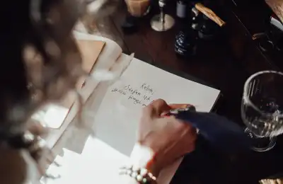 overhead shot of woman writing in notebook