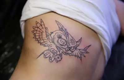 Feather With Birds Tattoo Meaning