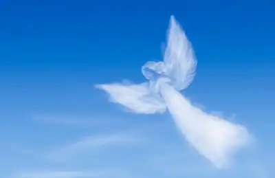 A guardian angel in the clouds