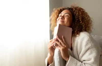Happy woman journaling about the future