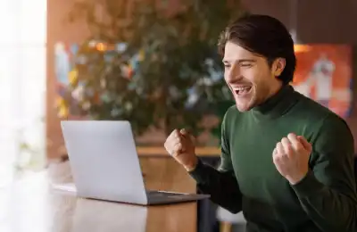 An image of someone looking happy after finding out they got their dream job.
