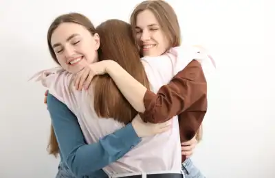 Friends hugging