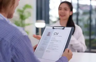 Someone holding a CV