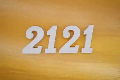 2121 written in white on a gold background