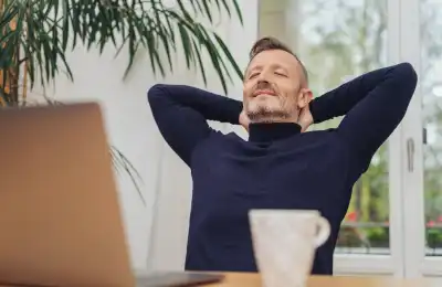 Man leaning back in a chair