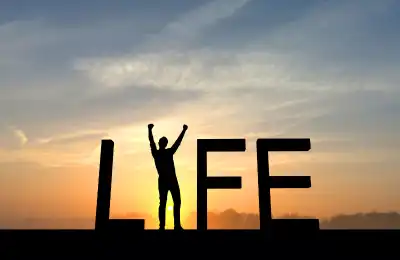 Image of a sunset with the word 'life.'