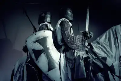 Two knights on a horse with swords and a shield
