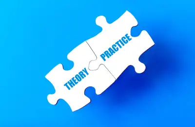 Image of a jigsaw saying 'theory' and 'practice'