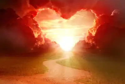 A heart made out of clouds at the end of a path