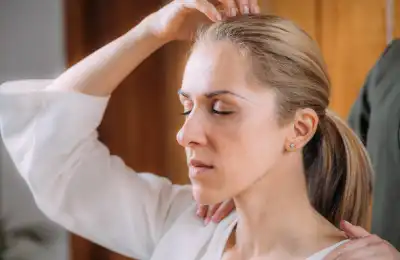Woman tapping the top of her head
