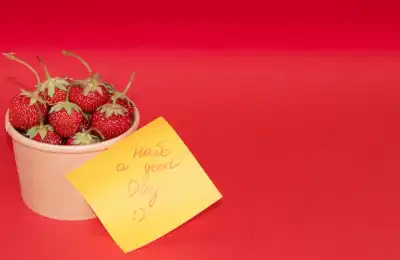 tub of strawberries and positive note