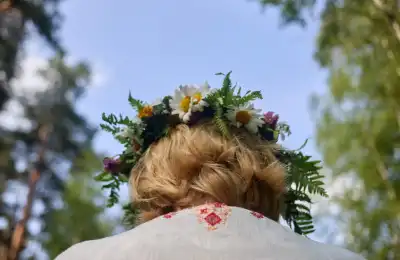 Image of someone wearing a flower crown.