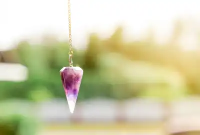 An amethyst crystal pendulum