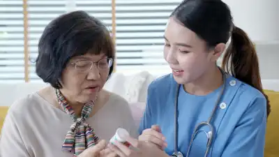 nurse giving patient medication