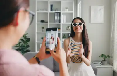 An image of someone filming a TikTok video.