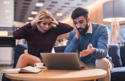 Image of a couple miscommunicating and struggling with technology.