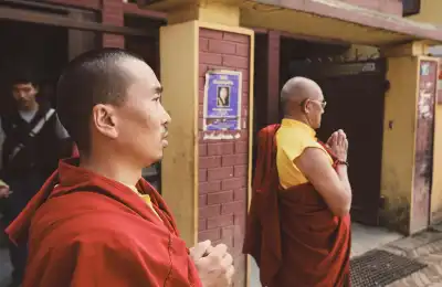 Buddhist monks praying together