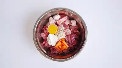 A bowl foods that make up a typical raw feeding diet