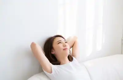 woman relaxing in white room