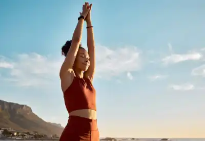 Woman meditating outdoors