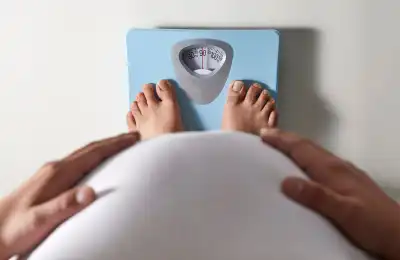 Standing on a weight scale
