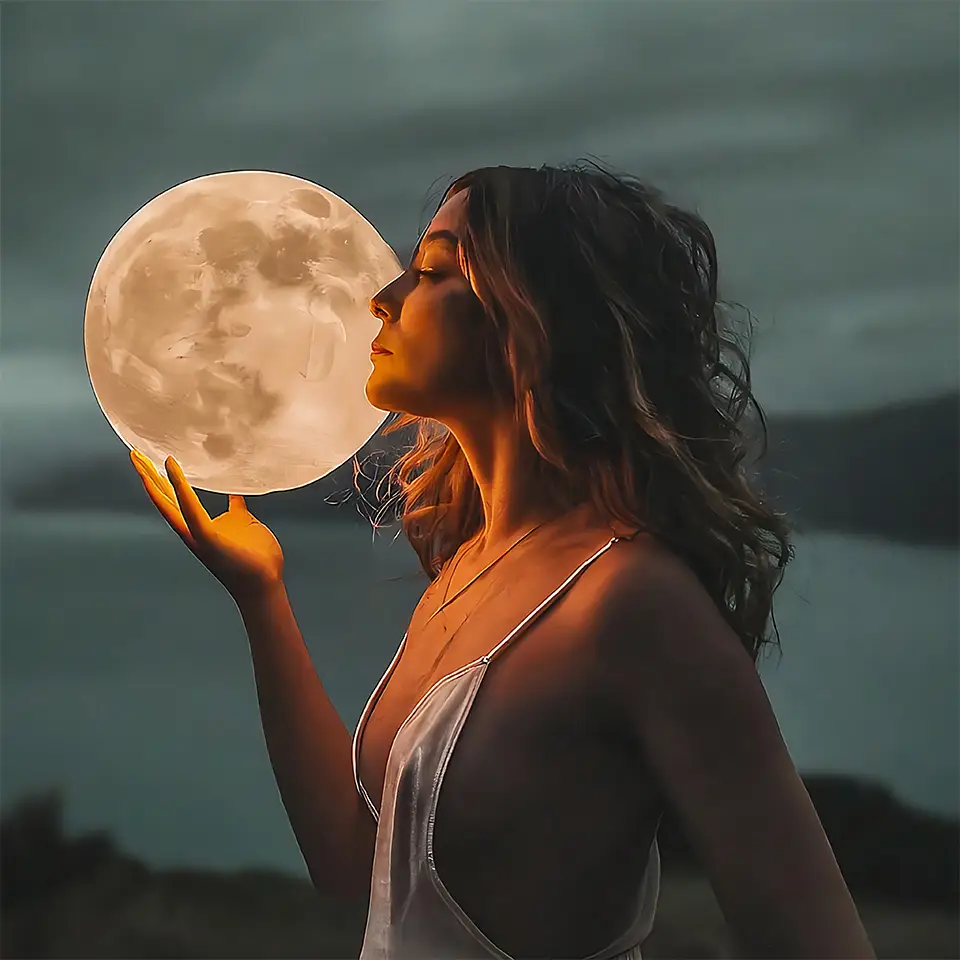 A woman holding a glowing moon