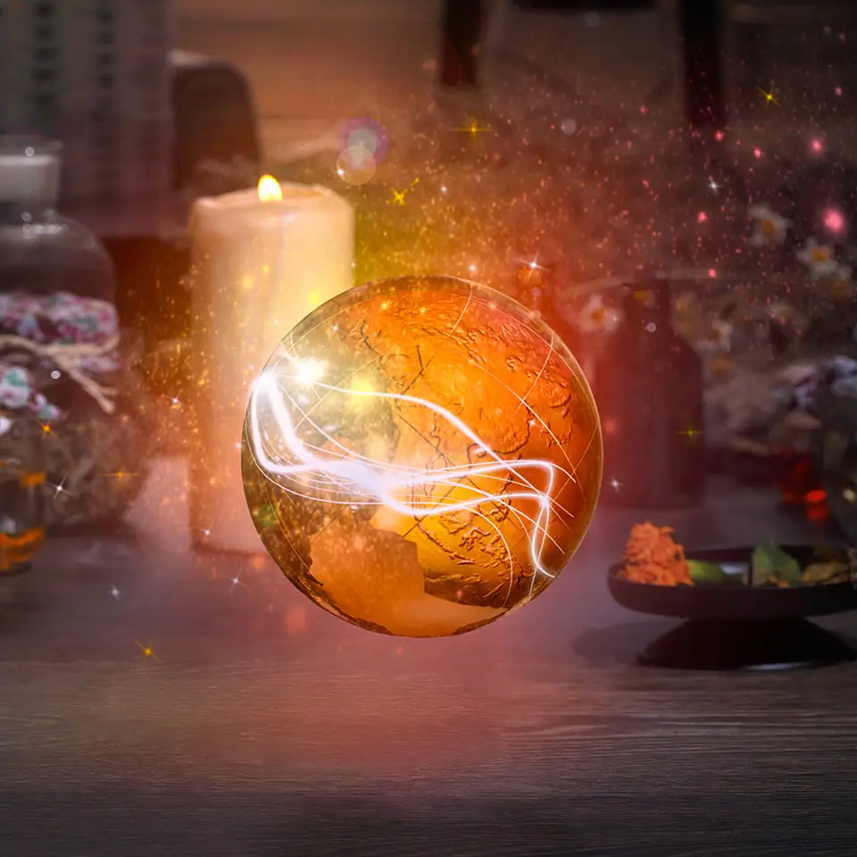 Golden sphere of orange light hovering above an alchemist's table