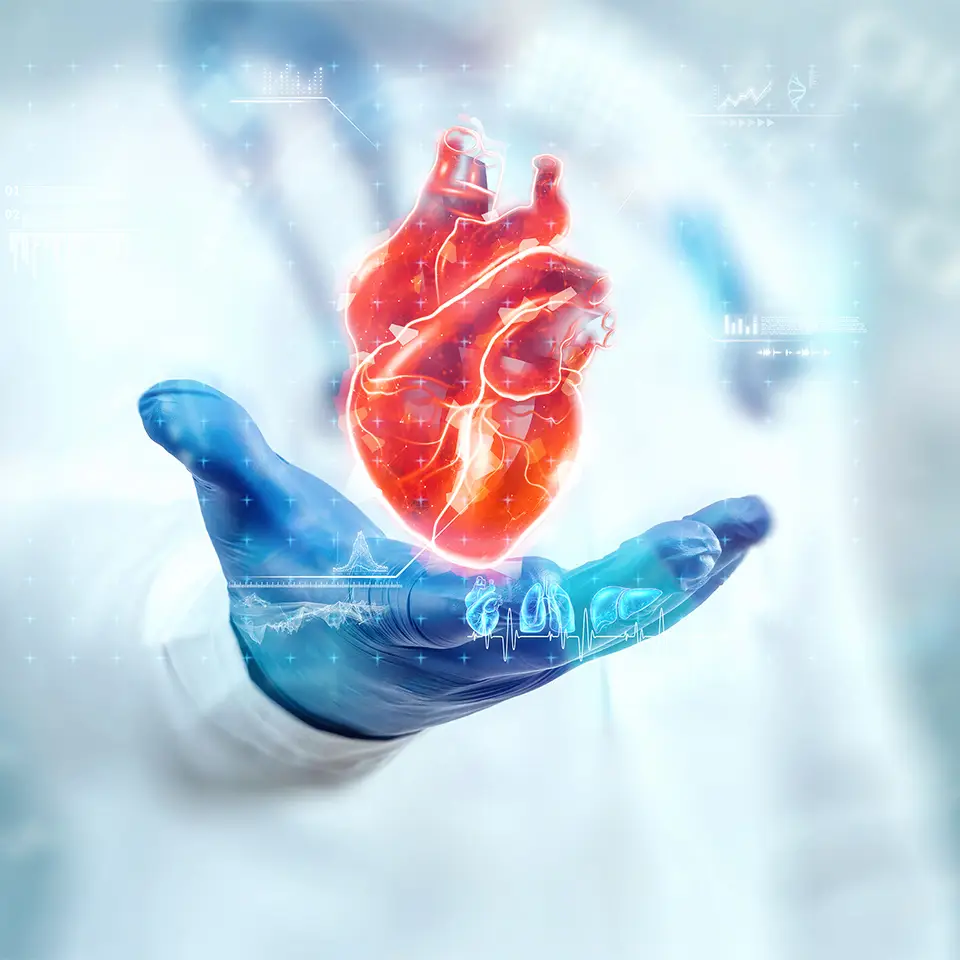A hologram of a heart floating above a doctor’s hand