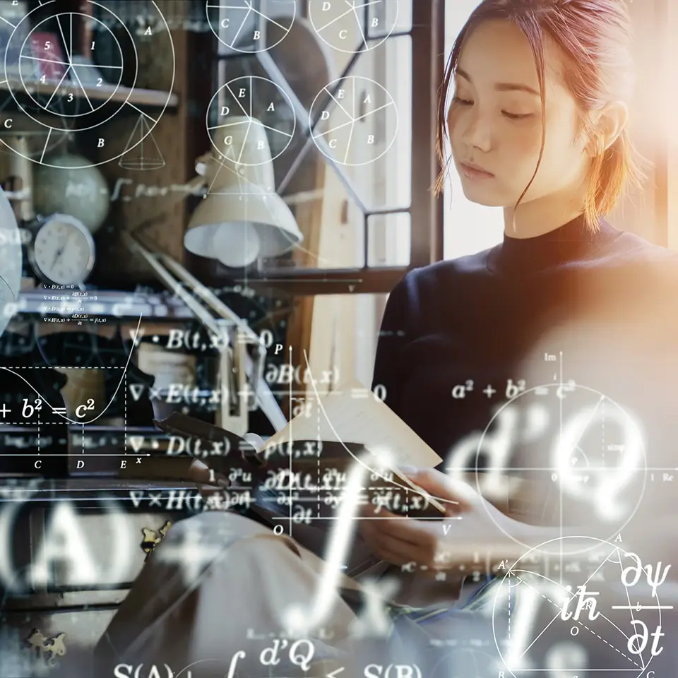 Woman studying overlaid with equations