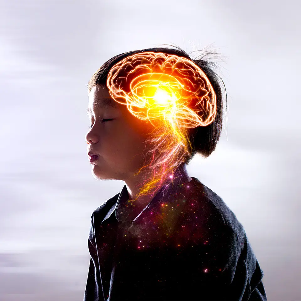 Image of a child with an illustration of the brain’s nervous system over the top of their head