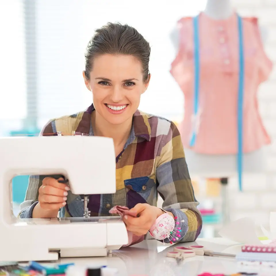 Dressmaker at a sewing machine